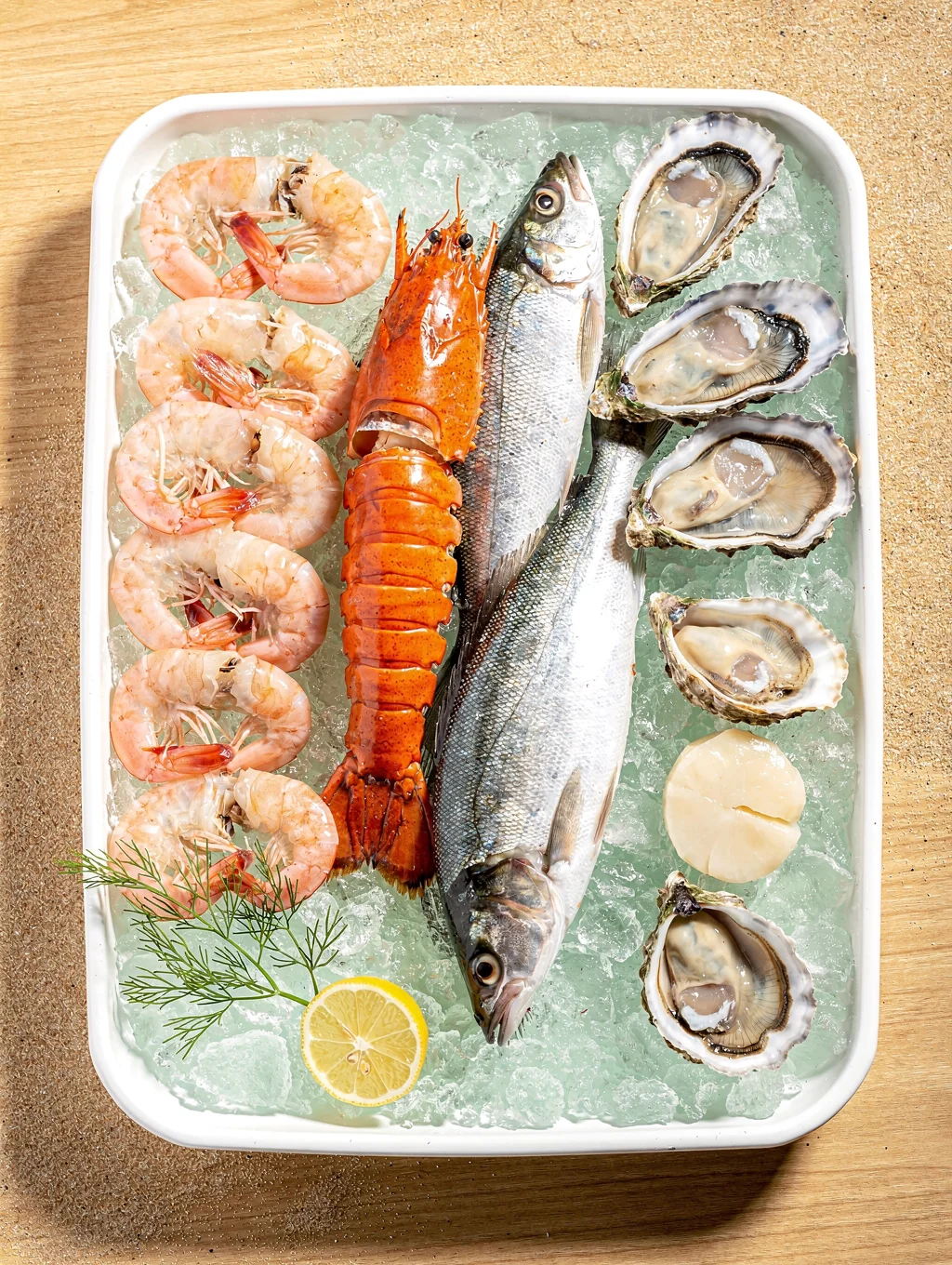 Fresh wild-caught Mozambican prawns and seafood on glistening crushed ice